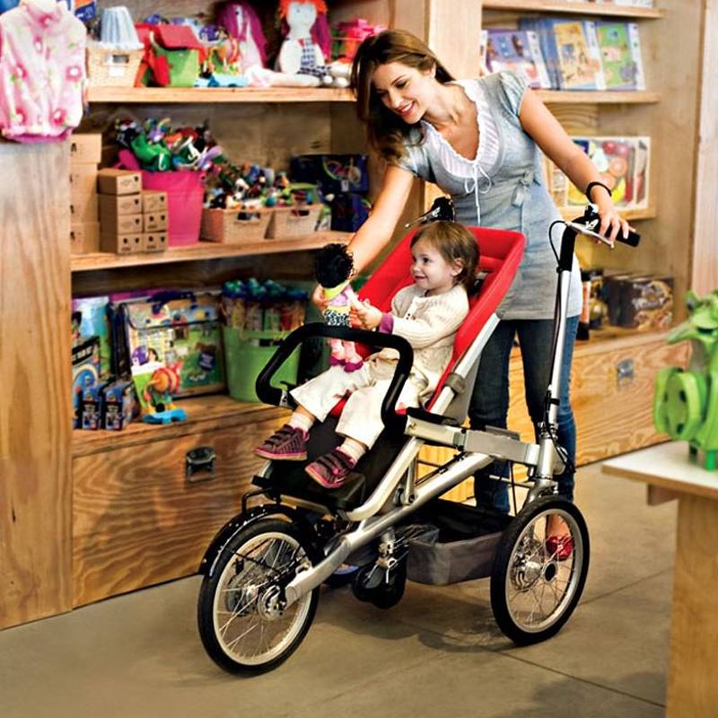 Купи мама коляски. Коляска-велосипед taga Bike. Коляска-велосипед для мамы taga. Коляска велотрансформер taga. Велосипед-трансформер Bike от Smart Shag.